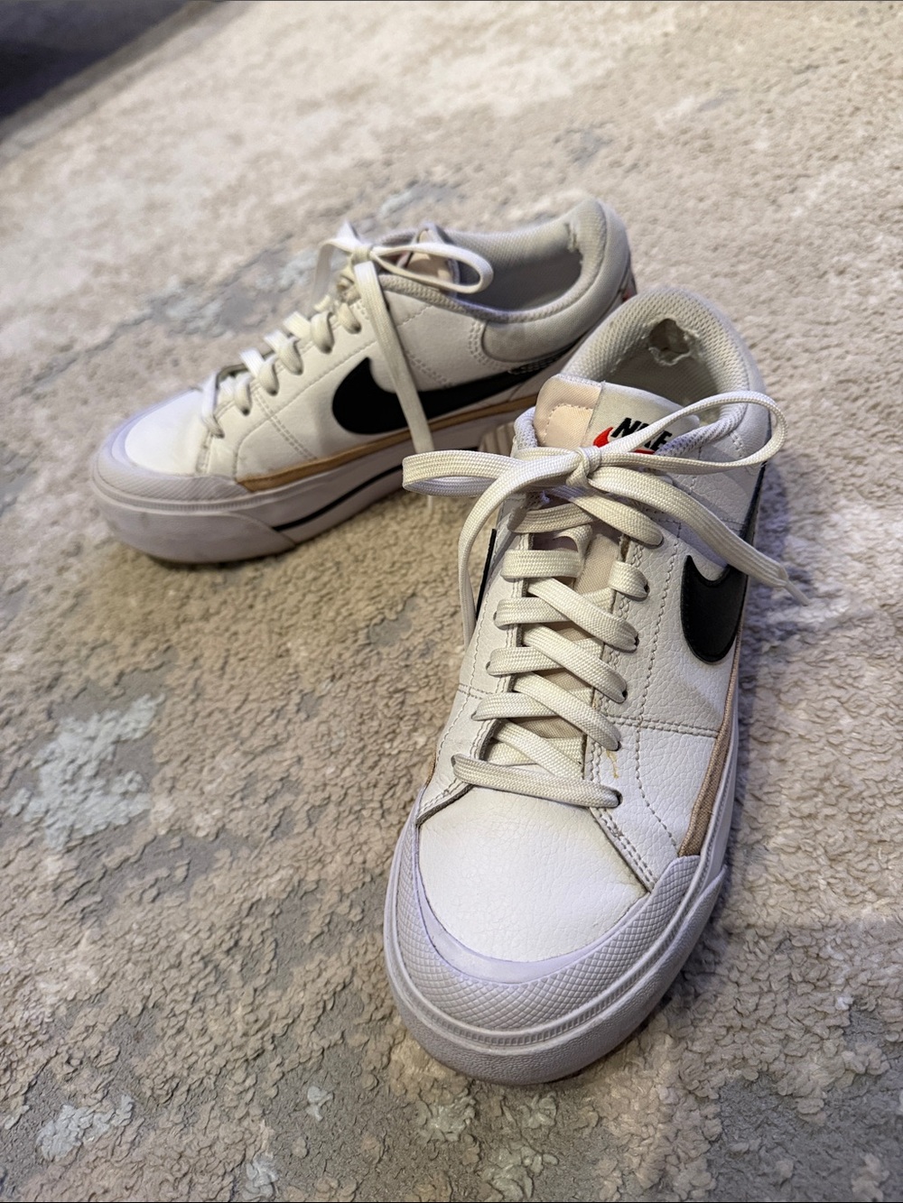Nike women’s White Sneakers with Black Swoosh and Tan Accents
